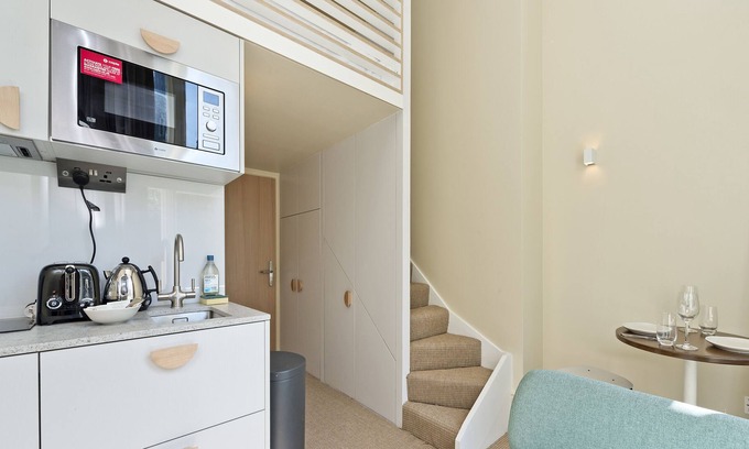Camden Town with Primrose Hill Apartamento | Mezzanine Flat With Garden Views Near Regents Park