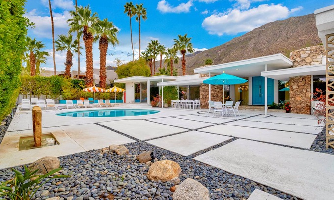 Historic Tennis Club Casa | Mid-century modern estate with a pool, hot tub, gourmet kitchen, and fireplace