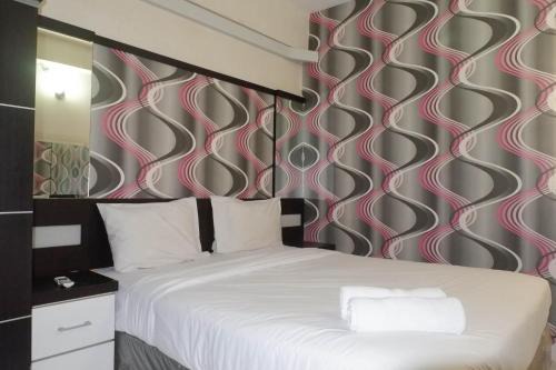 Surabaya Apartamento | Minimalist 2BR Apartment at Dian Regency By Travelio