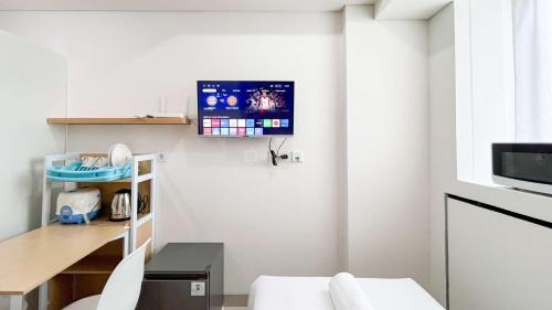 Makassar Apartamento | Minimalist Studio (No Kitchen) at Bandaraya - Tallasa City Makassar Apartment By Travelio