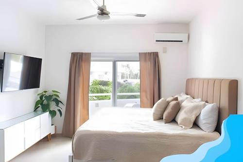Punta Sam Apartamento | Minimalist Studio with Pool and FREE Scooter