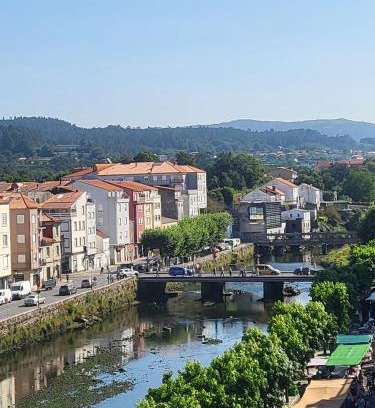 Noia Apartamento | Mirador urbano sobre el rio
