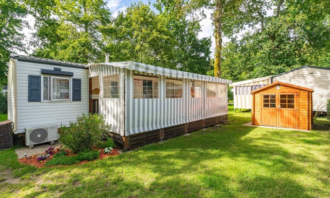 Semussac Alquiler De RV | Mobil Home 'Mobil Home 6p Proche De La Mer' con terraza privada y aire acondicionado