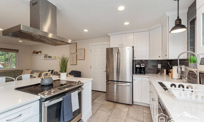 Northwest Arvada Casa | Mod-Chic Retreat Lux Kitchen Game Rm Patio