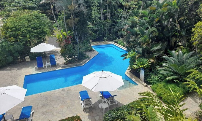 ProCab Apartamento | Modern 2BR – Poolside Escape, Walk to Beach, Kids-Friendly Stay