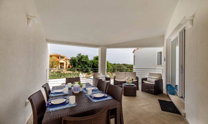 Monte Petrosu Apartamento | apartamento moderno a 5 min. del mar con piscina, aire acondicionado y wi-fi