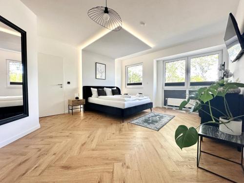 Rauental Apartamento | Modern Apartment - für Freunde & Familien, stadtnah, Parkplatz, E-Ladestation, Gitterbox für Fahrräder, Fitnessstudio, digitale Gästemappe mit Restaurant- und Unternehmenstipps