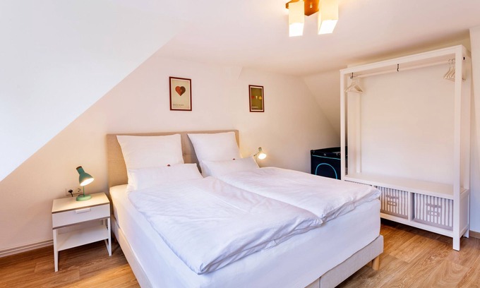 Bad Sachsa Apartamento | Apartamento moderno en una casa con entramado de madera en el centro de la ciudad.