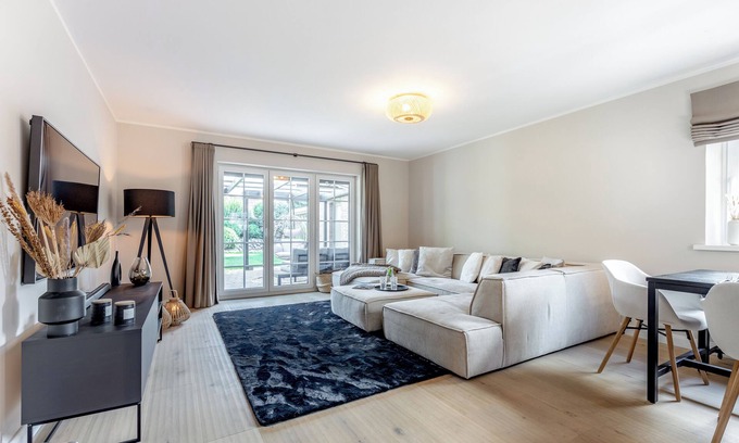 Sylt-Ost Apartamento | Modern first floor apartment with spacious terrace and private garden