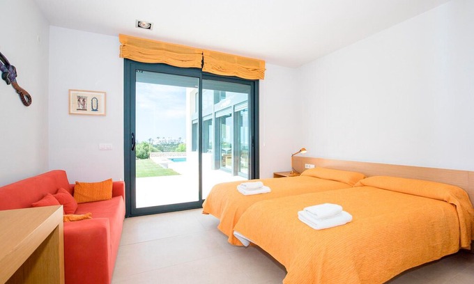 Es Canutells Villa | Modern holiday home with sea view for families- Casa Forma Nou