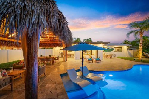 Coral Ridge Isles Casa | Modern Home w Private Suite Pool & Tiki Hut