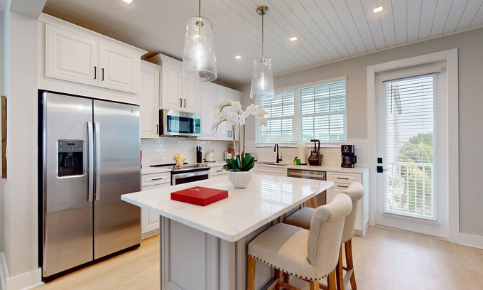 Cortez Casa | Modern home with screened-in balcony, pool, bikes, & EV charger - great location