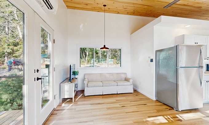 Sandy Point Cabaña | Modern Maine cottage with river views, deck, and a convenient washer/dryer