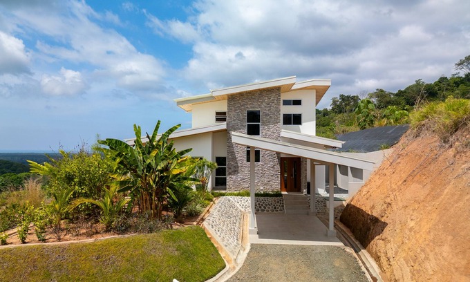 Chontales Casa | Modern mountain side villa with stunning ocean view. 20 minutes to the beach!