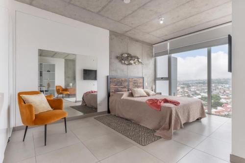 Curridabat Apartamento | Modern Oasis iFreses, 18th floor! AC, TV and Pool
