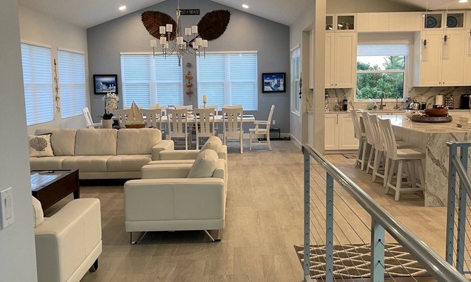 South Beach Casa | Modern pool with spa, 25 steps to private beach access.