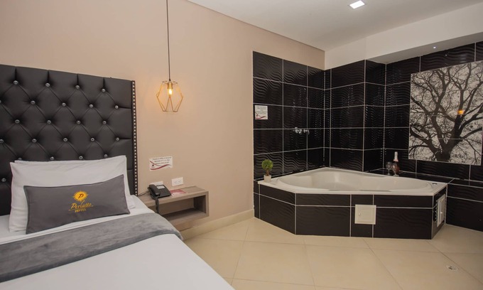 Bello Hotel | Habitación Deluxe con bañera hidromasaje en Bello