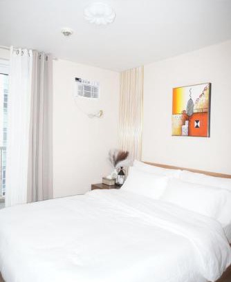 Pinagsama Apartamento | Modern Rustic Pet Friendly Condo in Mckinley Hill BGC