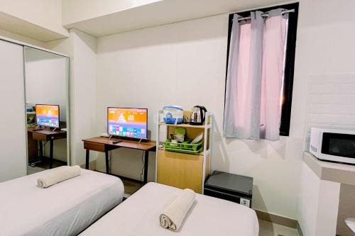 Makassar Apartamento | Modern Studio (No Kitchen) at Bandaraya - Tallasa City Makassar Apartment By Travelio