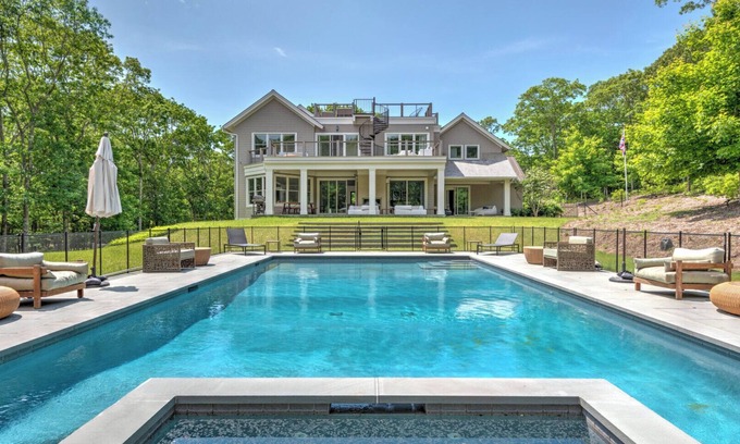 Amagansett North Casa | Modern-style home with heated private pool, open-floor plan, ample natural...