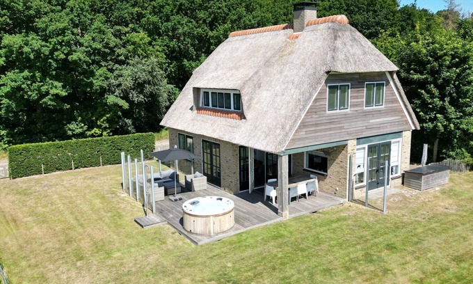 Hollum Casa | Modern villa with jacuzzi. Village Hollum, forest and beach on walking distance.