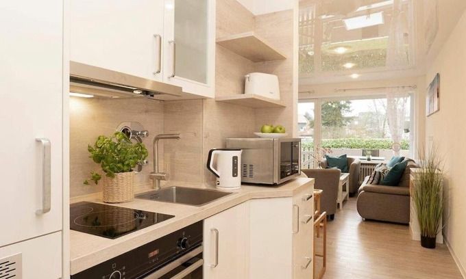 Groemitz Apartamento | Moderne Ferienwohnung Grömitz mit Garten/Terrasse