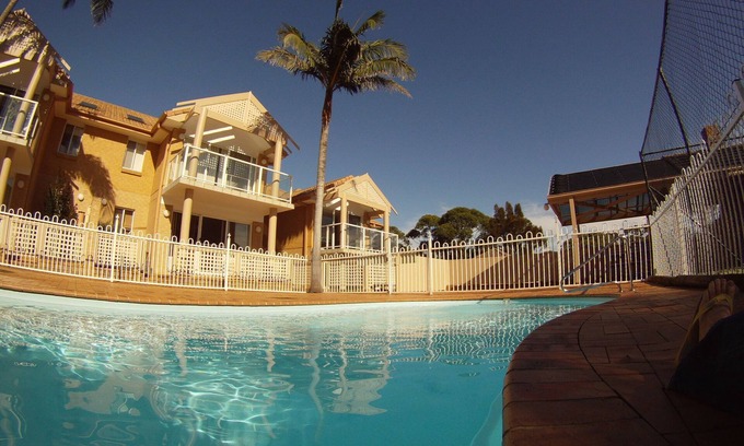 Mollymook Beach Apartamento | Mollymook Sands - Unidad 14. Ropa de cama incluida. A pie de cafeterías, tiendas y playa.