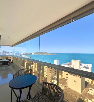 Praia do Morro Apartamento | Momentos inesquecíveis em um novo e moderno apto na Praia do Morro, com deslumbrante vista mar, a uma quadra da praia, redes de proteção, quartos com ar condicionado, roupas de cama e banho, TV 65, internet, prédio com piscina, portaria 24 horas e 2 vagas