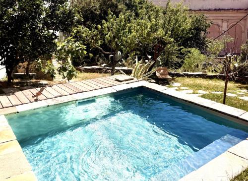 Bastia Apartamento | MONTERA Appartement Centre-ville avec piscine chauffée et jardin