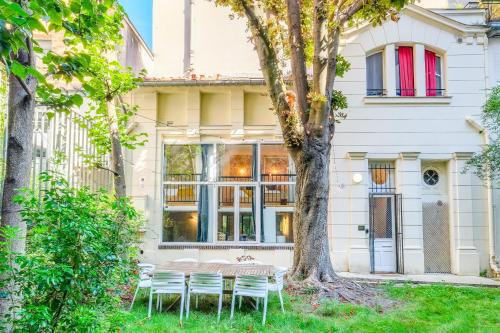 Quartier de Rochechouart Apartamento | MONTMARTRE Sacré-Coeur, appartement jardin 6 à 8P