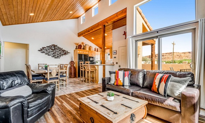 Moab South Valley Casa | Mountain view home with patio, gas fireplaces & shared pool/hot tub - 2 dogs OK