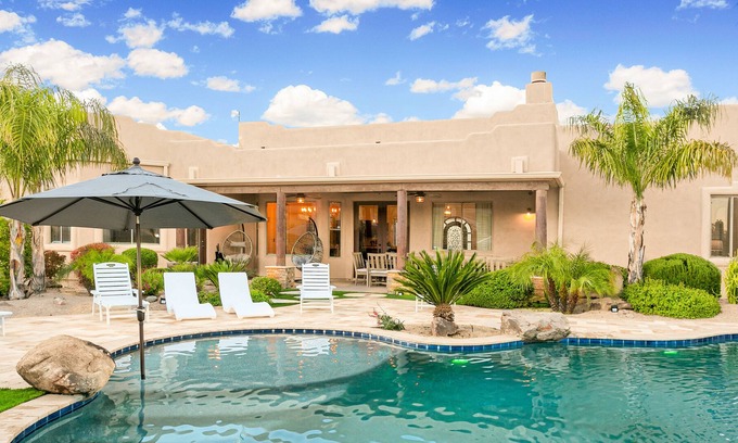 Anthem Casa | Mountain-view stay with sprawling outdoor space, pool, hot tub, & putting green