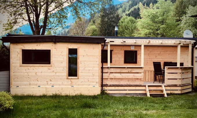 Distelberg Otro | Mountainview Lodge - Chalet im Zillertal direkt am 5 Sterne Campingplatz Aufenfeld mit Hallenbad und Sauna