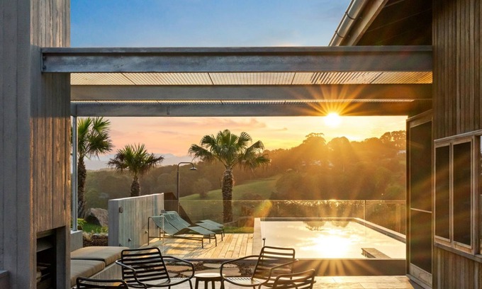 Myocum Casa | Myocum Ridge Farm - A winding driveway, cows, blue skies, manicured lawns, glittering pool