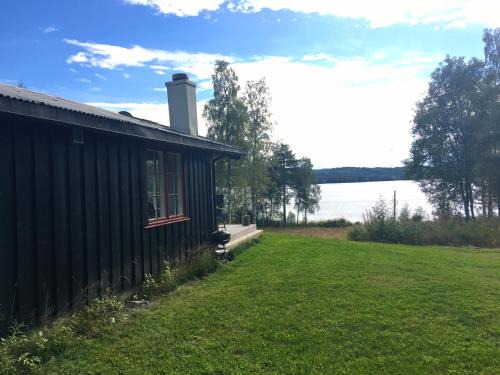 Ringsaker Casa | Nærglimt - cabin by the lake Næra