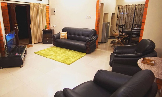 Coimbatore Casa | Nandhanam Eco Home Stay AC con opciones de bicicletas / automóviles