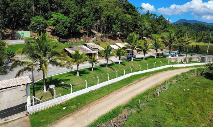 Camboriu Casa | Natural Refuge in Balneário Camboriú: Beach, Beach Tennis and Pool in Harmony