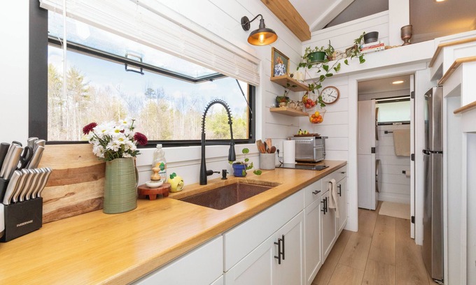 Alexander Casa | Nestled in the mountains, this cozy tiny home is 15 minutes to Asheville.