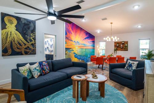 Whitney Beach Casa | NEW! Blue Iguana! Tropical backyard oasis with heated pool, hot tub, fire table, and more!