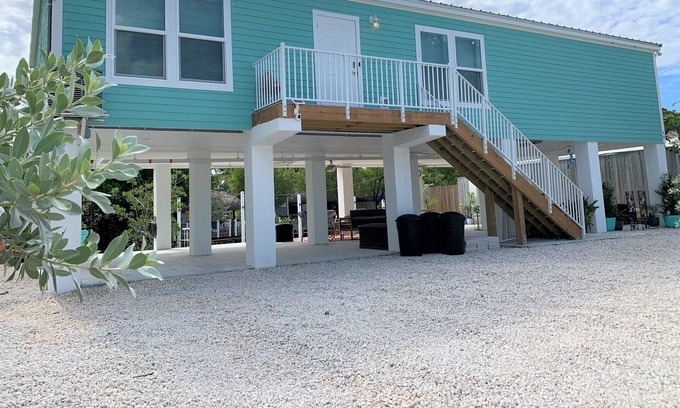 Key West Casa | New-build, luxury canal front home w/ dock, firepit, micro pool