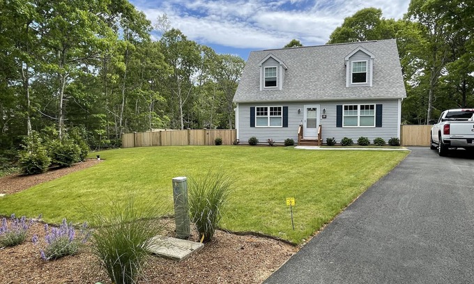 East Dennis Casa | New construction cape house close to shops and 3 miles from the beach .