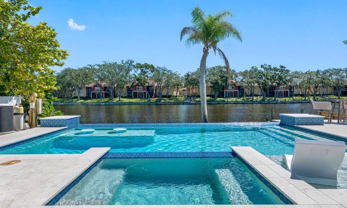 Cove Casa | NEW Heated Salt Pool & Spa on Waterfront Canal