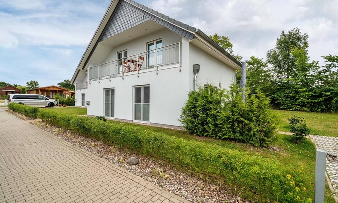 Gross Nemerow Casa | Casa de vacaciones 'Ferienhaus Seeglück2 Am Tollensesee' con vistas al lago, terraza privada y Wi-Fi