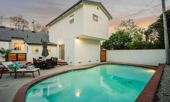 The Plaza Casa | *New* modern pool home + 5 mi to beach + sleeps 14