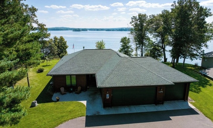 Spooner Casa | New Nautical Neighbors Lake Home on Spooner Lake, sleeps 16