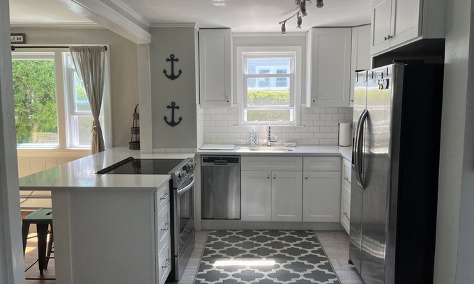 Silver Beach Cabaña | New Silver Beach Cottage just a short walk to association beach and harbor!