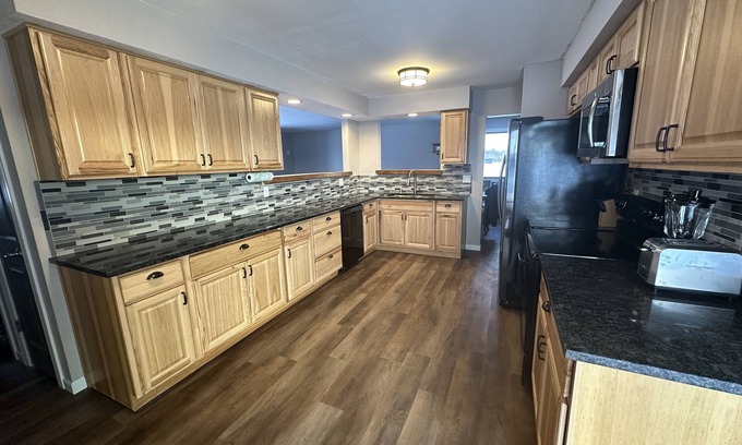 Waldo Casa | NEW Three bedroom ranch style pet friendly home with a patio & theatre room!