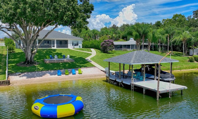 Lake Placid Casa | Newer Home on Lake June with Beach, Dock, Screened Patio and Hot Tub!