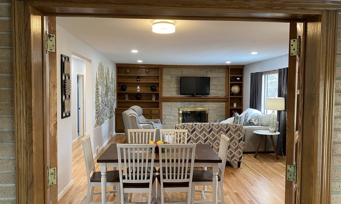 Des Moines Casa | Newly Remodeled Brick Home with wall Sculptures by the Airport