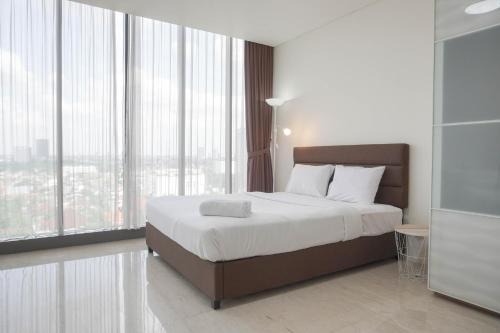 Pancoran Apartamento | Nice and Elegant 1BR at L'avenue Pancoran Apartment By Travelio